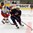 LUCERNE, SWITZERLAND - APRIL 16: USA's Matthew Tkachuk #7 plays the puck while Russia's Dmitri Sokolov #18 chases him down during preliminary round action at the 2015 IIHF Ice Hockey U18 World Championship. (Photo by Matt Zambonin/HHOF-IIHF Images)


